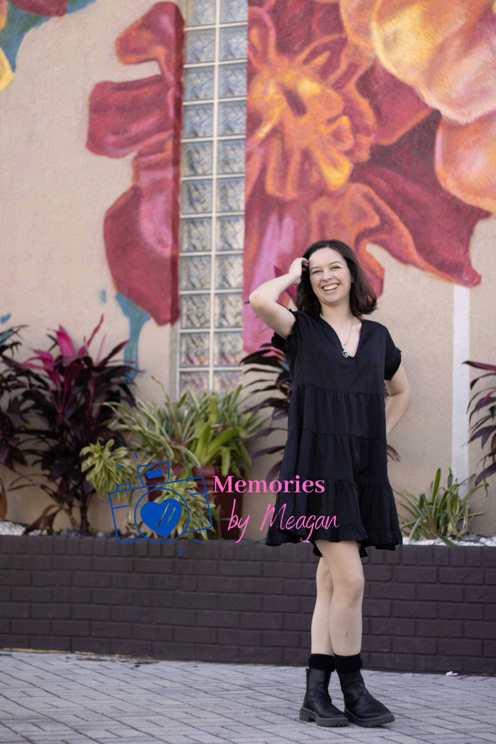 Girl laughing at a photoshoot. 