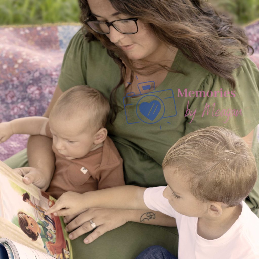 Fmaily sitting in a Florida nature reserve with a book. 